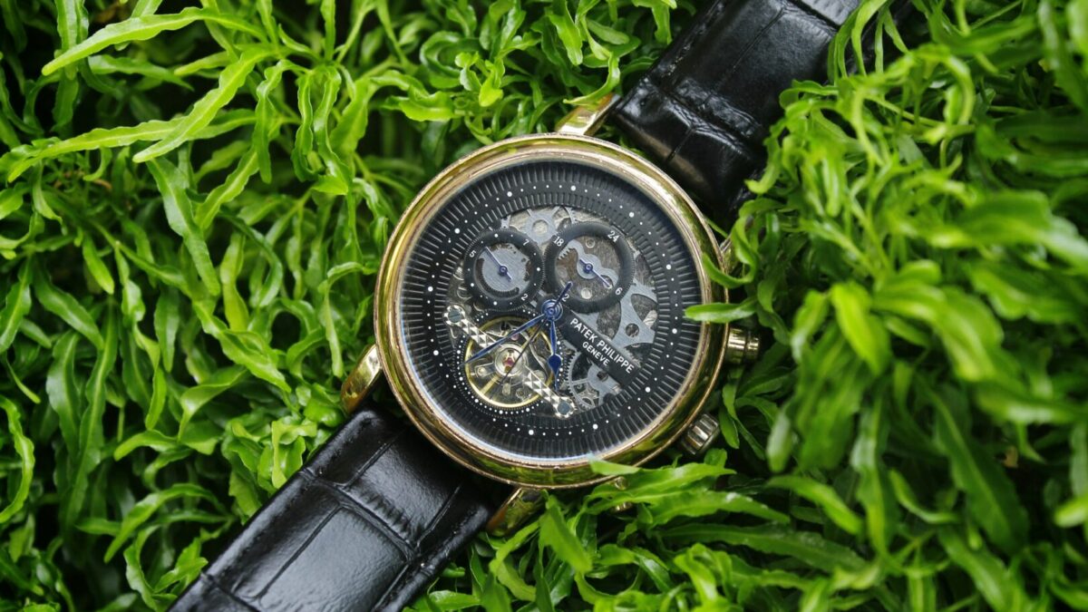 patek philippe geneve black watch with gold rim